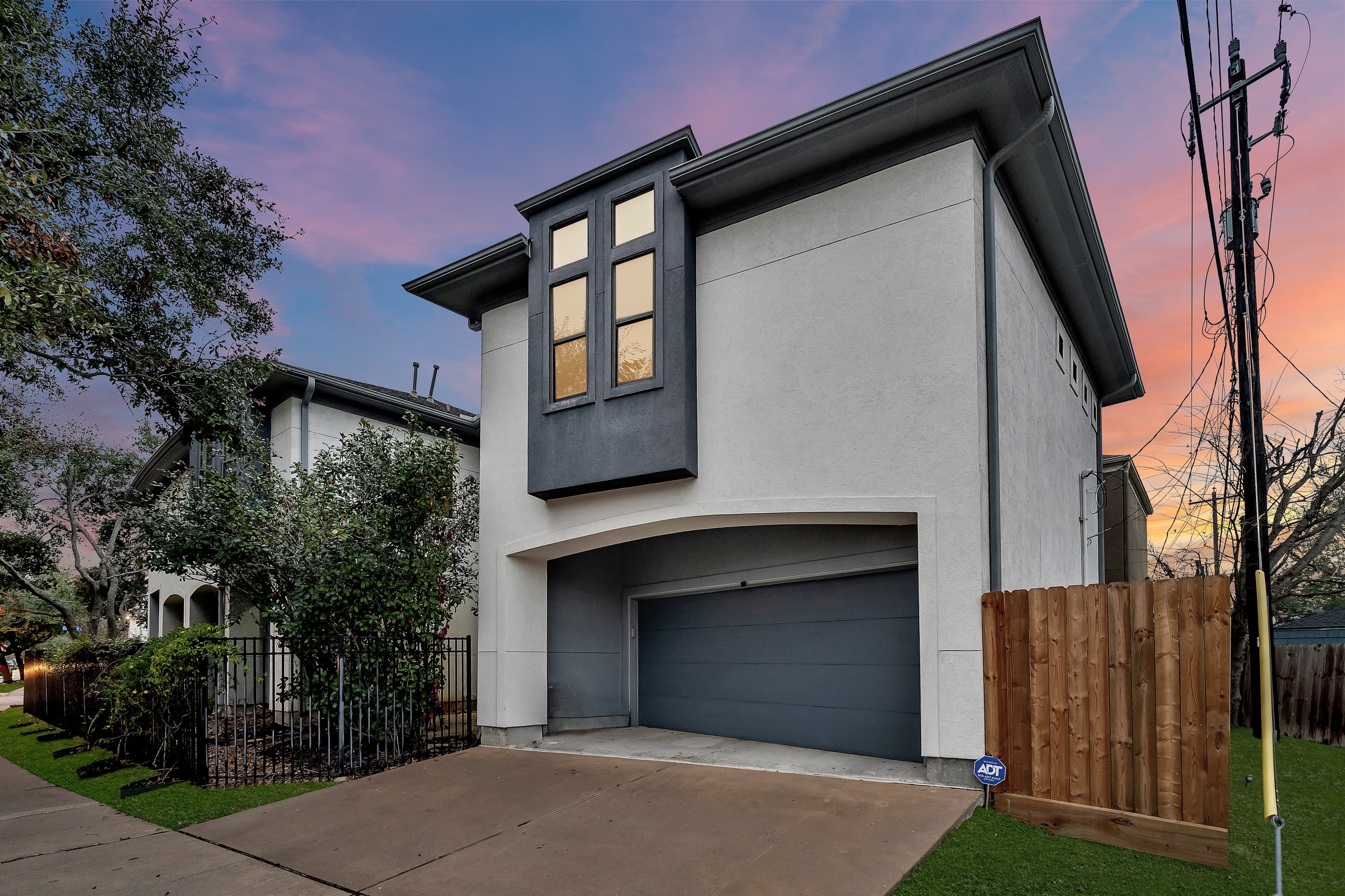 Twilight exterior of a contemporary two-story home